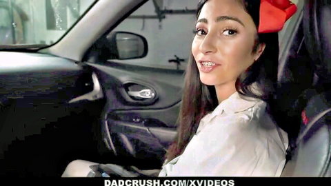 Jasmine Vega smiles seductively in car, white shirt tease from DadCrush