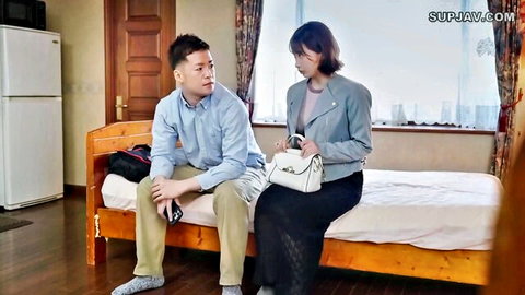 Asian couple in Squid Game JAV parody, clothed on bed