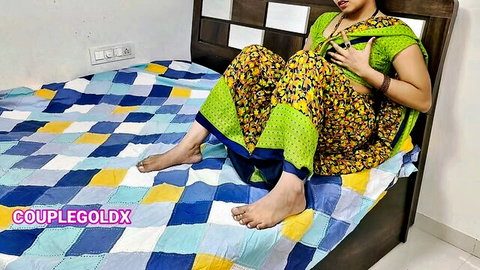Desi wife Chintu in colorful saree, seductively posing on bed