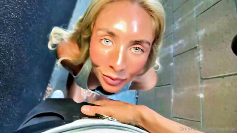 Bonnie Blue blonde in seductive POV close-up, flushed face and tank top