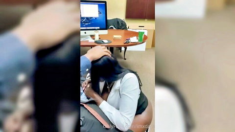Jenise in office lap tease with man, black woman in blouse and skirt