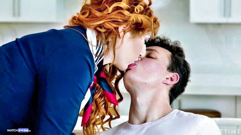 Lauren Phillips redhead MILF passionately kissing young stud