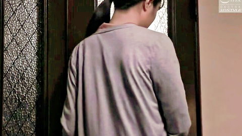 Kanon Nakajo back view in gray shirt at door, JAV bride scene
