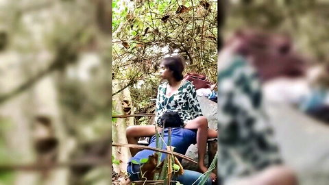 Sri Lankan woman exposes huge tits straddling man outdoors in jungle