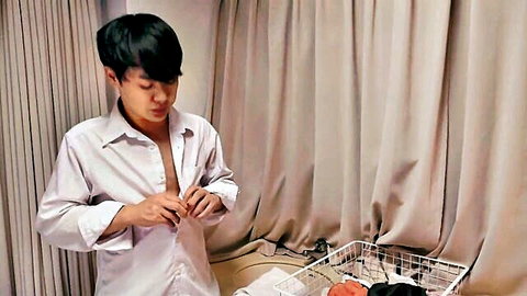 Young Asian man in unbuttoned white shirt, from Yumiko Mitsuse's JAV scene