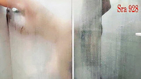 Skinny girl inserts dildo into pussy in steamy shower solo masturbation