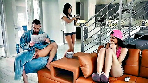 Hot Asian teen in pink cap with stepdad exposed on couch, friend nearby