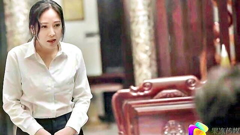 Apologetic Chinese wife in fitted white blouse and skirt