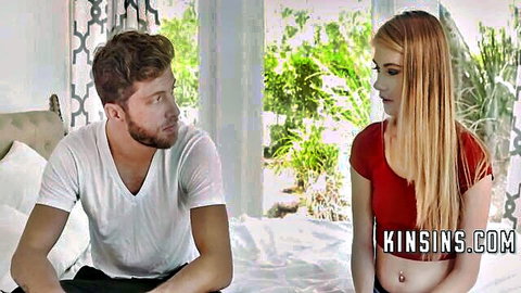 Hannah Hays in red top chatting with stepbrother on bed