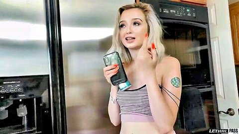 Lexi Lore blonde in striped bralette holding phone tease