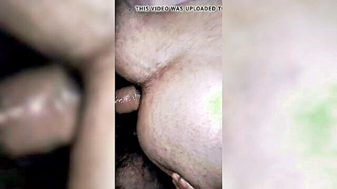 Blurry closeup of hairy pussy spread wide from behind in doggy style with thick bush and wet lips