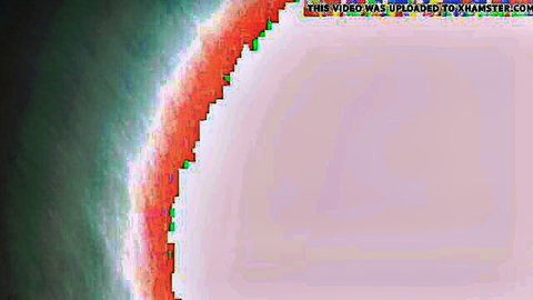 XHamster watermark overlay on pixelated green-red gradient background