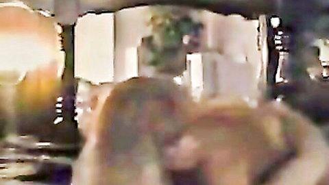 Blurry mature couple in intimate embrace during sex scene