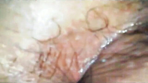 Close-up of young chubby Latina's wet hairy pussy lips and ass