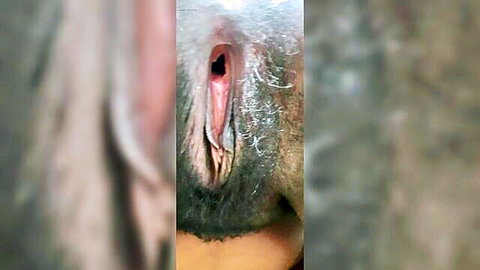 Hairy Indian mature mom removes night dress to show and finger her hairy pussy
