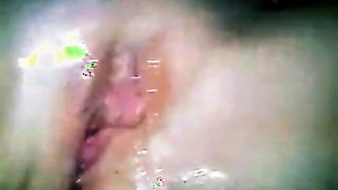 Close-up of hot mature woman's wet pussy in explicit solo scene