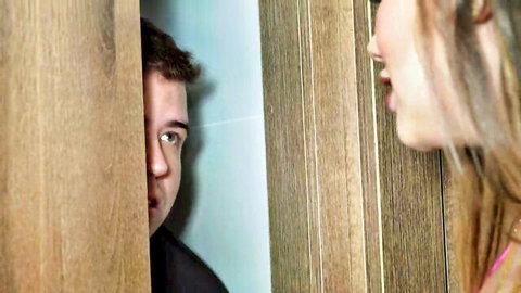 Sara Blonde teases lover through door in sultry bedroom encounter