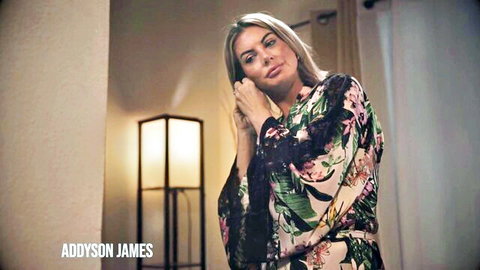 Blonde Addyson James in floral robe, seductive pose