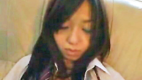 Cute Asian teen in white blouse, seductive pout in JAV scene