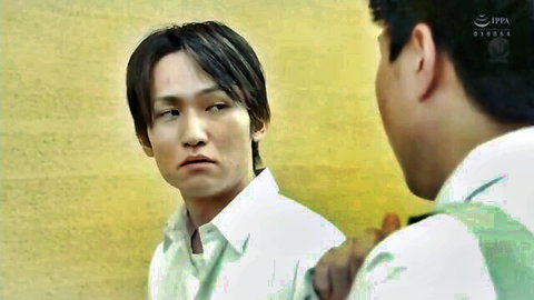 Asian MIL in blue top and white pants teases son-in-law at door