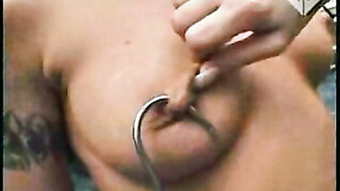 Extreme tit torture close-up with blue nail polish and skin marks