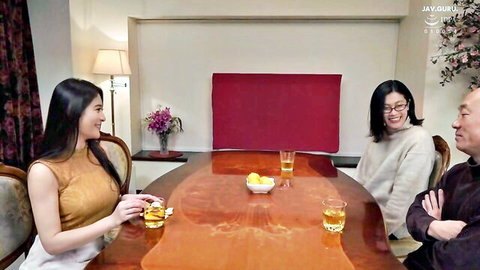 Young busty Japanese brunette in tank top shows cleavage at dinner with older Asian couple
