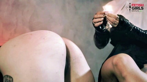 Naughty Nun bends over, showing big pale ass in fetish latex gloves with candle