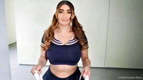 Violet Myers in sexy sailor Halloween outfit with pom poms, teasing cleavage