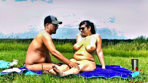 Andi Peacock nude outdoor sex with partner in grassy field