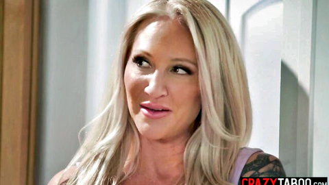 Blonde big tits MILF stepmom in pink top looking seductive