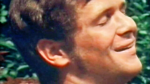Vintage close-up of smiling man with brown hair in Tabu Film old porn thumbnail