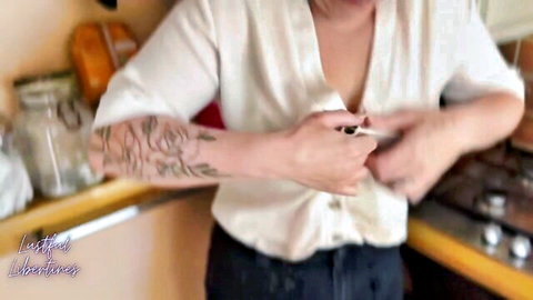 MILF best friend unbuttoning white blouse, revealing deep cleavage and arm tattoos