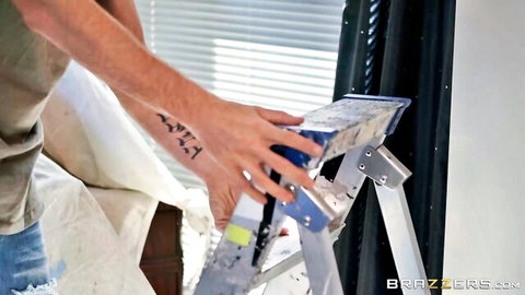 Tattooed painter on ladder in bedroom setup for Brazzers scene