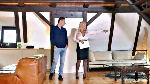 Angel Wicky as busty blonde realtor in skirt and stockings with client