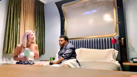 Blonde hotwife chats intimately with black stud on bed, her new obsession