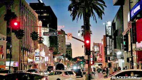 Myra Moans redhead in BBC scene on neon-lit Hollywood street