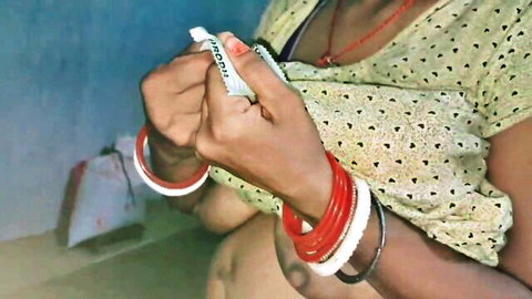 Prayamu11 in green blouse with red bangles, slender hands teasing in Indian style