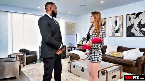 Redhead babe in checkered miniskirt flirts with suited BBC bull in luxury living room