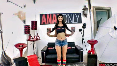 Skinny tanned Latina in ANAL ONLY crop top and tiny denim shorts posing seductively