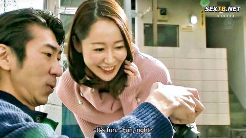 Yu Shinoda in pink cardigan holds hands with lover, smiling intimately in JAV cheating wife scene
