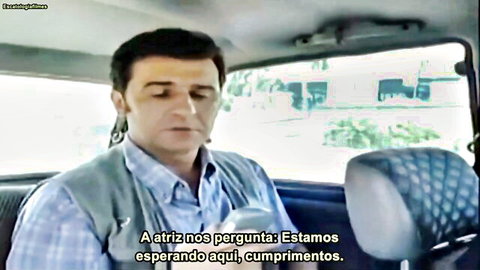Serbian man in car from Made in Serbian adult video, waiting for actress with PT/BR subtitles