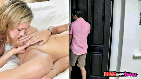 Brandi Love fingers Lia Lor's pussy in bed, man watches from door