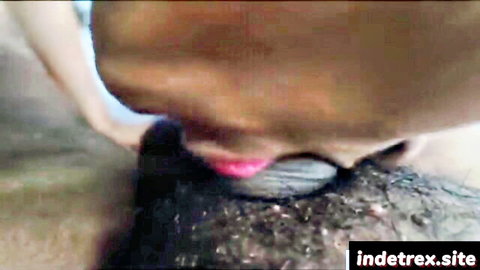 South Asian woman with pink lips sucking thick dark cock in intense homemade blowjob