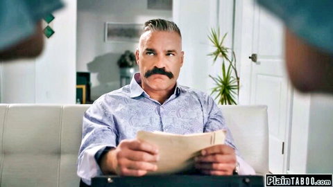 Mustached DILF stepdad sits on couch reading taboo letter fully clothed