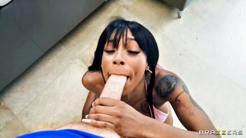Sarai Minx ebony beauty giving sloppy blowjob in pink top, intense oral close-up
