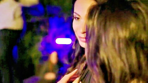 Anissa Kate seductive smile in black dress, blue night lights