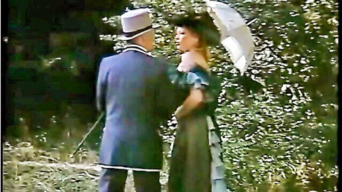 Vintage 1982 couple in period costumes embracing outdoors, Insatiable Janine