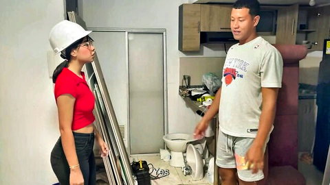 Sexy Asian teen in hardhat and tight pants chats flirtatiously with boss in bathroom renovation