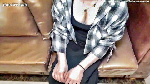 Mika in JAV uncensored, teasing cleavage in open plaid shirt and black dress
