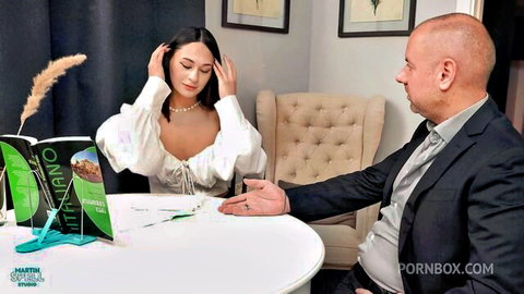 Roxy Muray young student in low-cut blouse with older suited man at table